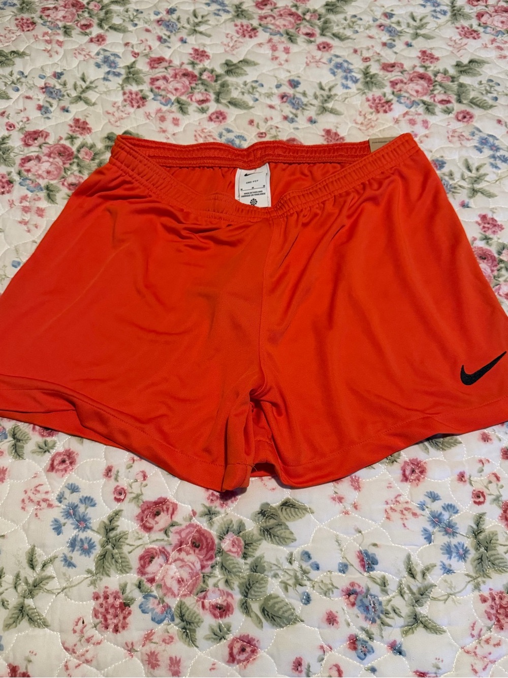 Nike Women’s Bright Orange Athletic Shorts with Swoosh